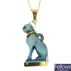A 'Bastet' ceramic pendant, with 9ct gold chain.