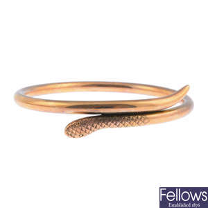 An early 20th century 9ct gold snake bangle.