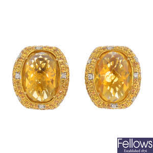 A pair of 18ct gold citrine, orange sapphire and diamond cluster earrings.