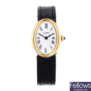 CARTIER - a yellow metal Baignoire wrist watch.