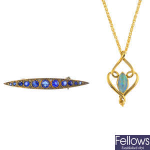 A 9ct gold opal triplet and diamond pendant, with 9ct gold chain and a paste brooch.