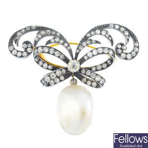 A natural blister pearl and diamond brooch.