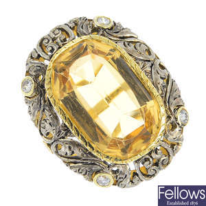 A citrine and diamond ring.