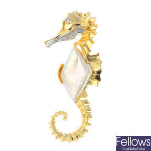 A cultured pearl and diamond seahorse brooch.