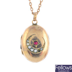 An early 20th century locket, suspended from a 9ct gold chain.