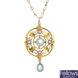 An early 20th century gold aquamarine and tourmaline pendant, with chain.