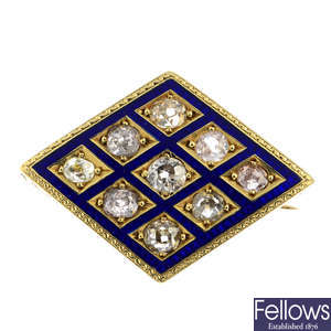 A mid 19th century gold diamond and enamel brooch.