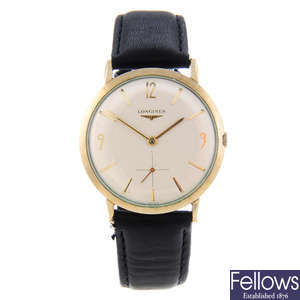 LONGINES - a gentleman's gold filled wrist watch with another Longines wrist watch.