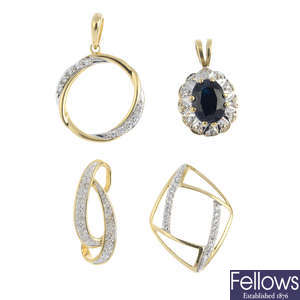 Four gem-set pendants.