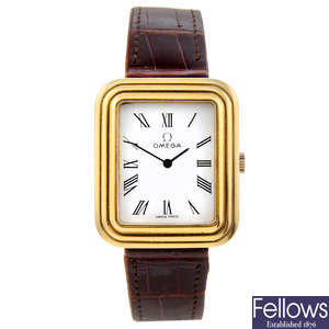 OMEGA - a gentleman's yellow metal wrist watch.