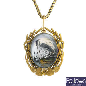 A mid Victorian 18ct gold reverse-carved intaglio pendant/brooch, with chain.