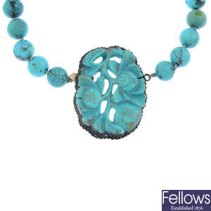 A Chinese carved turquoise necklace.