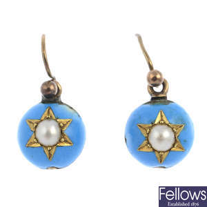 A pair of mid Victorian enamel and split pearl earrings.