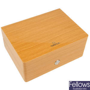 OMEGA - a group of eleven watch boxes. 