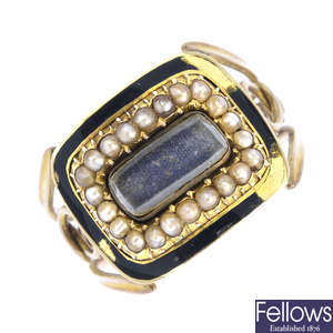 An early Victorian gold split pearl and enamel mourning ring.
