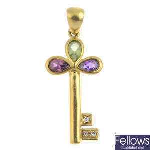 DAVID MORRIS - an 18ct gold diamond and gem-set key pendant.