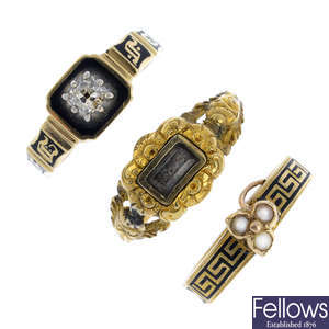 Three Victorian gold diamond, split pearl and enamel mourning rings.