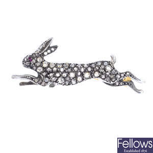 A ruby and diamond hare brooch.