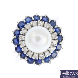 An 18ct gold cultured pearl, sapphire and diamond cluster ring.