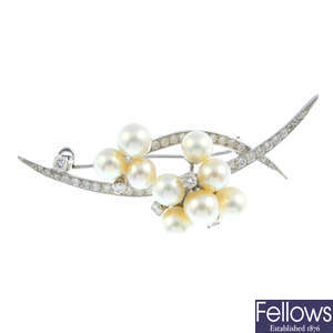 A mid 20th century 18ct gold cultured pearl and diamond brooch.