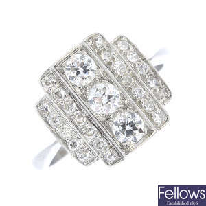 An Art Deco platinum diamond dress ring.