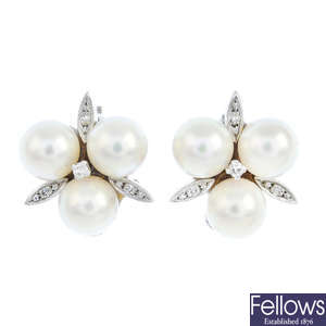 MIKIMOTO - a pair of cultured pearl and diamond earrings.