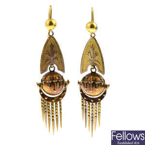 A pair of mid Victorian 18ct gold earrings.