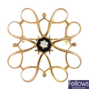 A 9ct gold diamond and enamel brooch.
