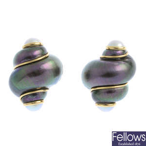 A pair of shell earrings.