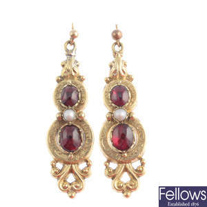 A pair of mid Victorian gold garnet and split pearl earrings.