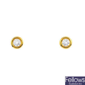 TIFFANY & CO. - a pair of 18ct gold diamond stud earrings, by Elsa Peretti.