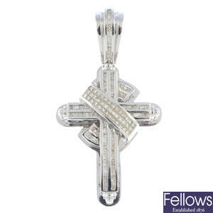 A 14ct gold diamond cross pendant.
