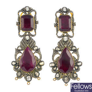 A pair of glass-filled ruby and diamond earrings.
