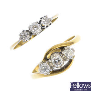Two diamond three-stone rings.
