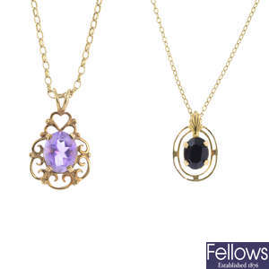 Four gem-set pendants, with chains.