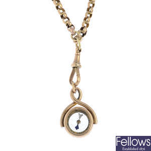A late Victorian 9ct gold longuard chain and a late Victorian 9ct gold compass fob.