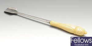 A George III silver & ivory-handled stilton scoop. 