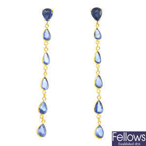 A pair of sapphire drop earrings.