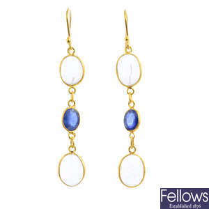 A pair of moonstone and sapphire earrings.