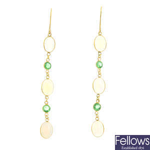 A pair of opal and green garnet earrings.