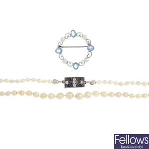 A 9ct gold aquamarine and seed pearl brooch and a cultured pearl single-strand necklace.