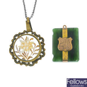A late Victorian gold nephrite pendant, and a paste pendant with chain.
