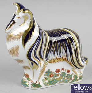 A Royal Crown Derby porcelain paperweight, modelled as a rough collie.