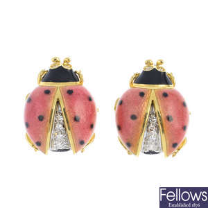 A pair of diamond and enamel ladybird earrings.
