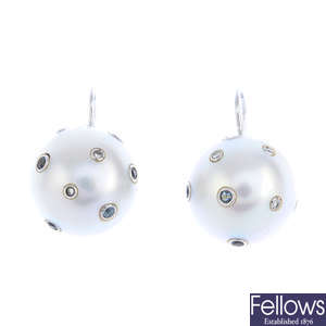 A pair of cultured pearl, diamond and aquamarine earrings.