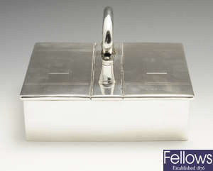 An early 20th century silver mounted dual compartment table cigarette box. 