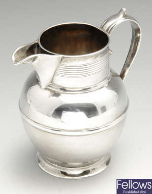 A George III small silver pitcher jug. 