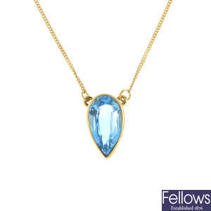 An 18ct gold topaz pendant, on chain.