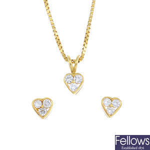 A set of 18ct gold diamond heart jewellery.