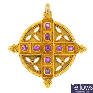 A mid Victorian Gothic Revival gold ruby pendant.